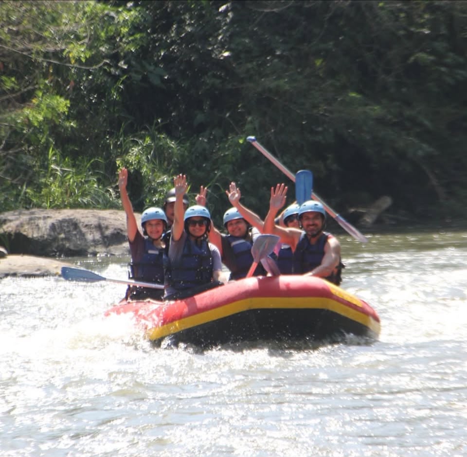 Travelers white-water rafting in Bali