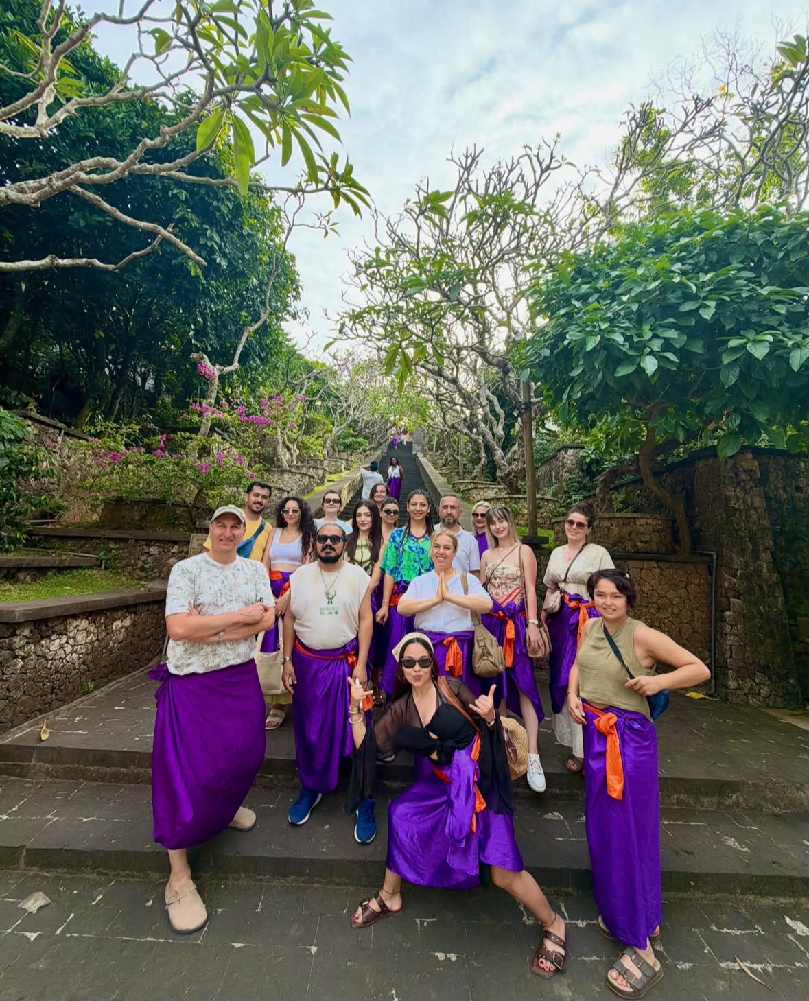 Travel group visiting a tropical landmark