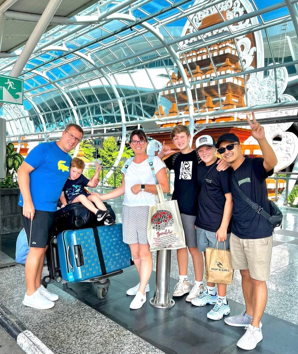 Family welcomed at their destination airport